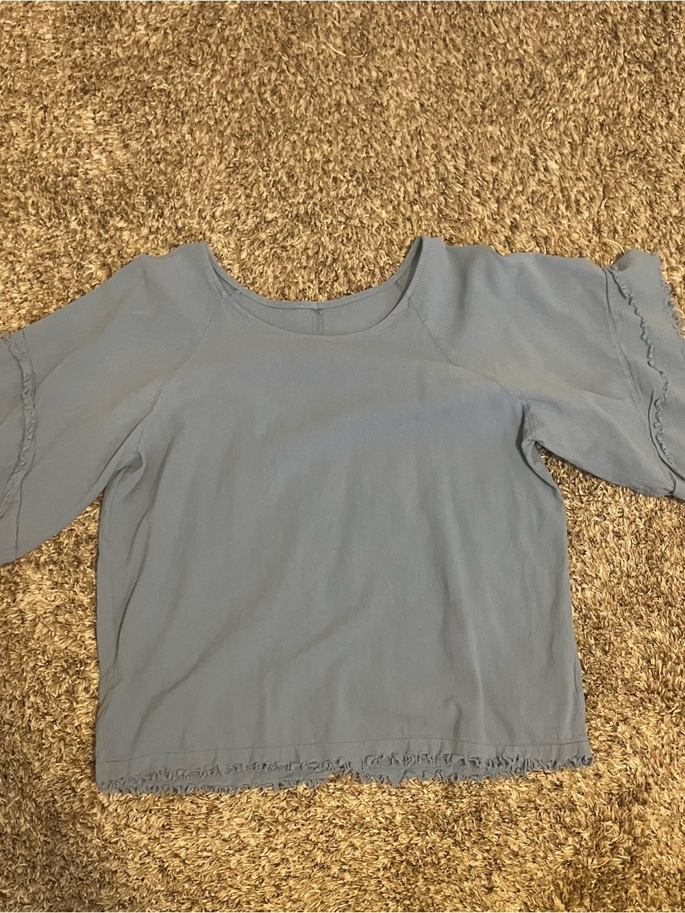 Women’s blue flare ruffle blouse